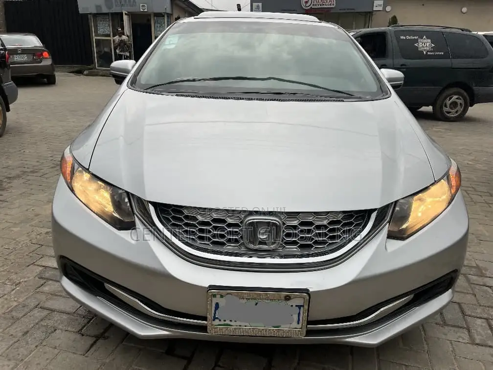 Honda Civic EX-L 4dr Sedan w/Nav (1.8L 4cyl CVT) 2014 Silver