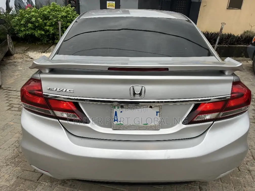 Honda Civic EX-L 4dr Sedan w/Nav (1.8L 4cyl CVT) 2014 Silver