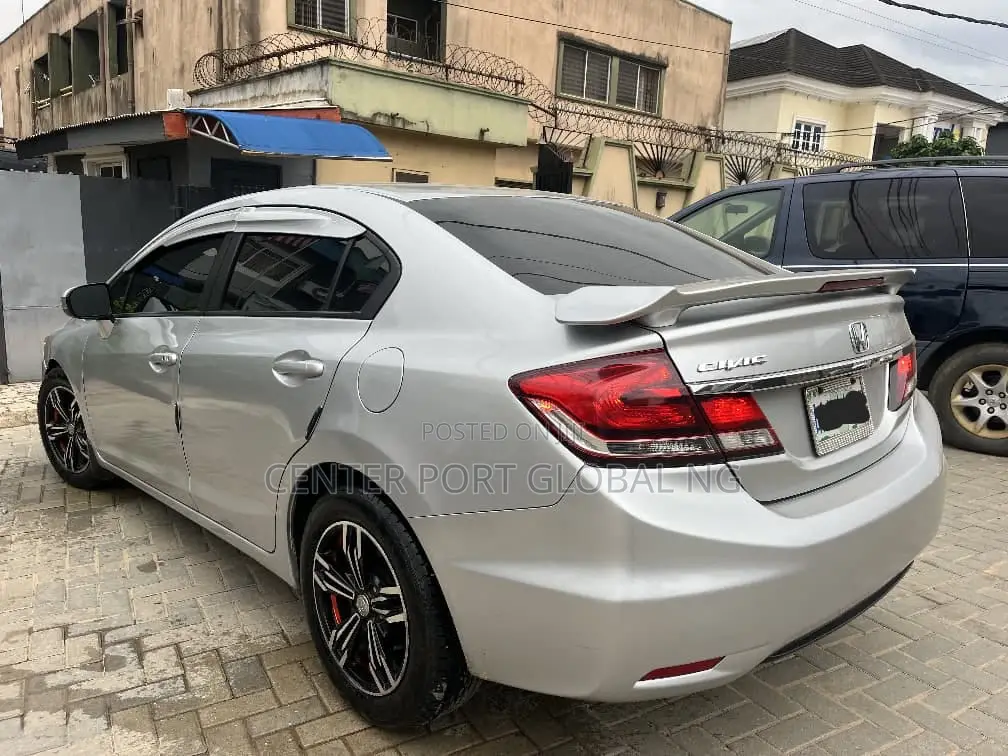 Honda Civic EX-L 4dr Sedan w/Nav (1.8L 4cyl CVT) 2014 Silver