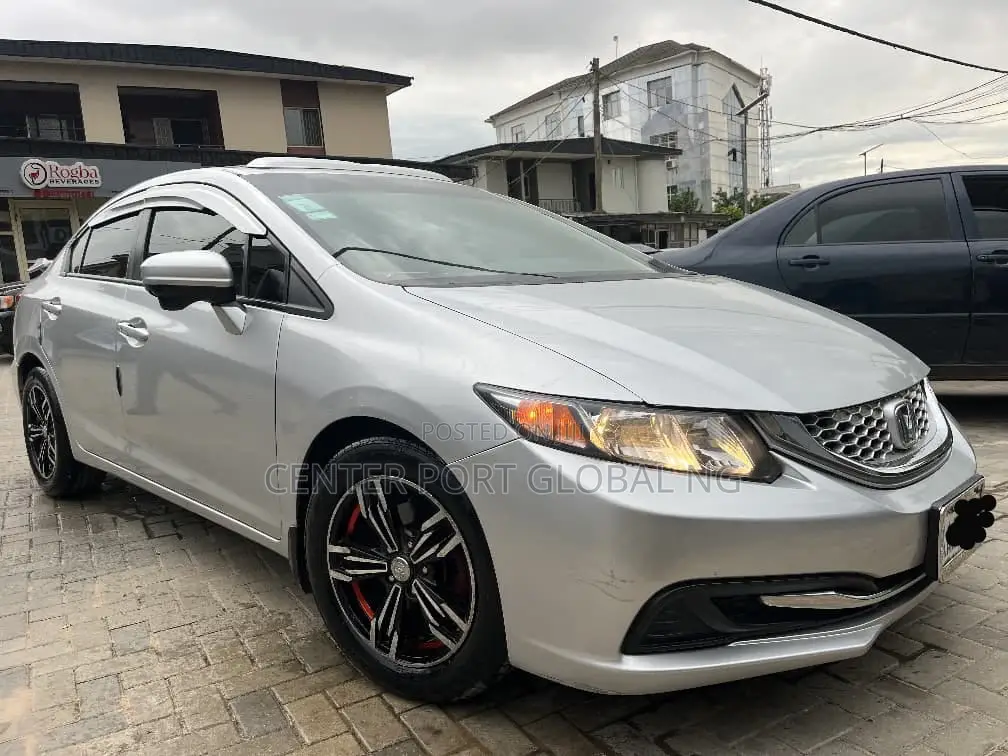Honda Civic EX-L 4dr Sedan w/Nav (1.8L 4cyl CVT) 2014 Silver