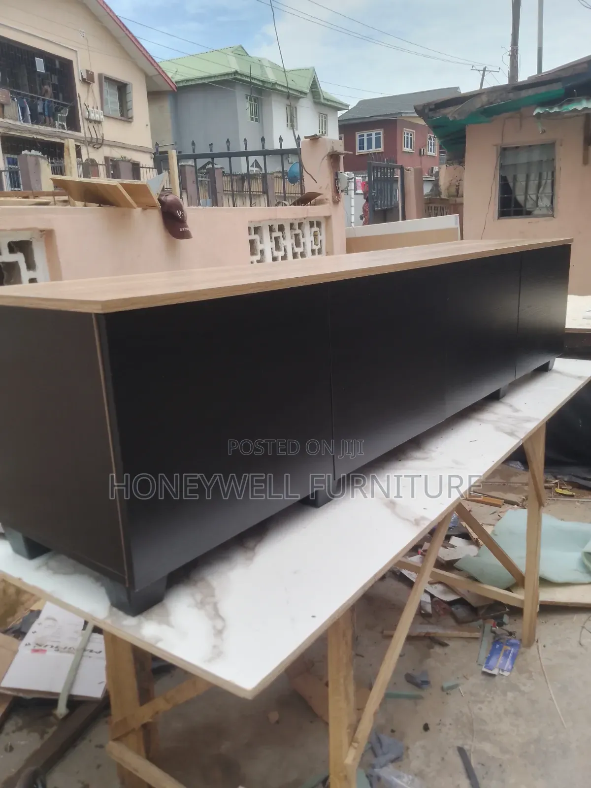 Black and Brown Tv Console Table With Four Drawers