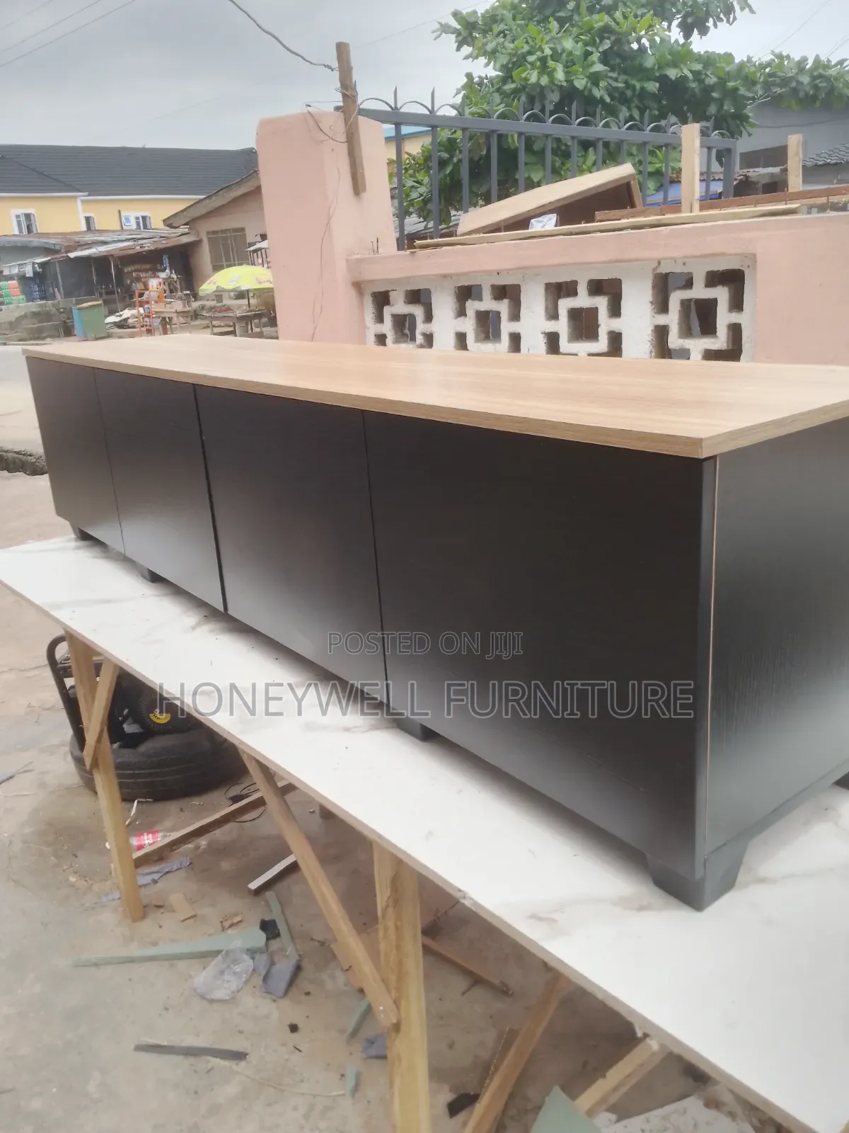 Black and Brown Tv Console Table With Four Drawers