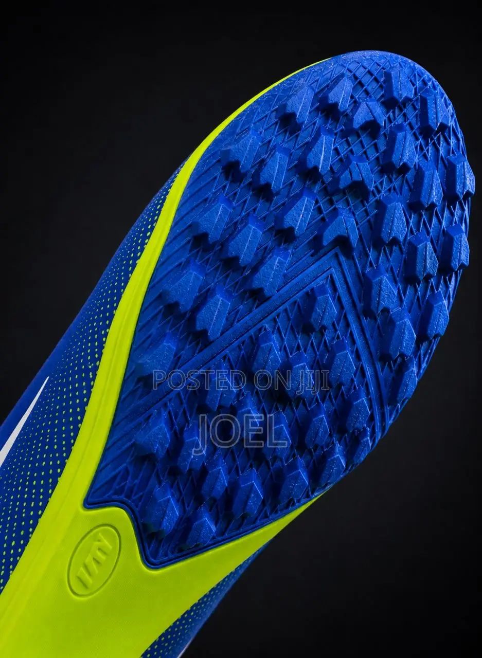Warrior Blue and Neon Green Turf Soccer Shoes