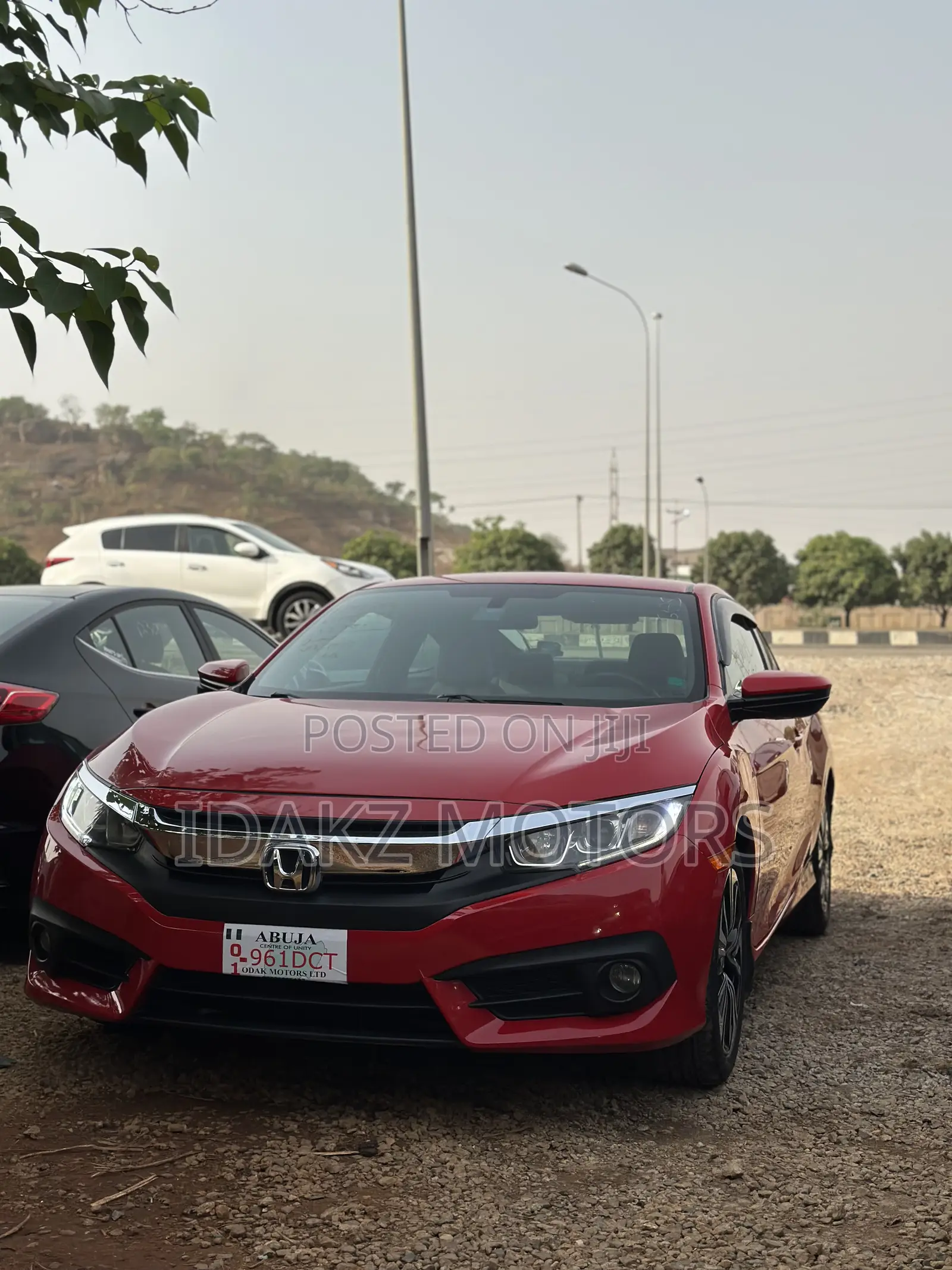Honda Civic Touring 2dr Coupe (1.5L 4cyl) 2017 Red