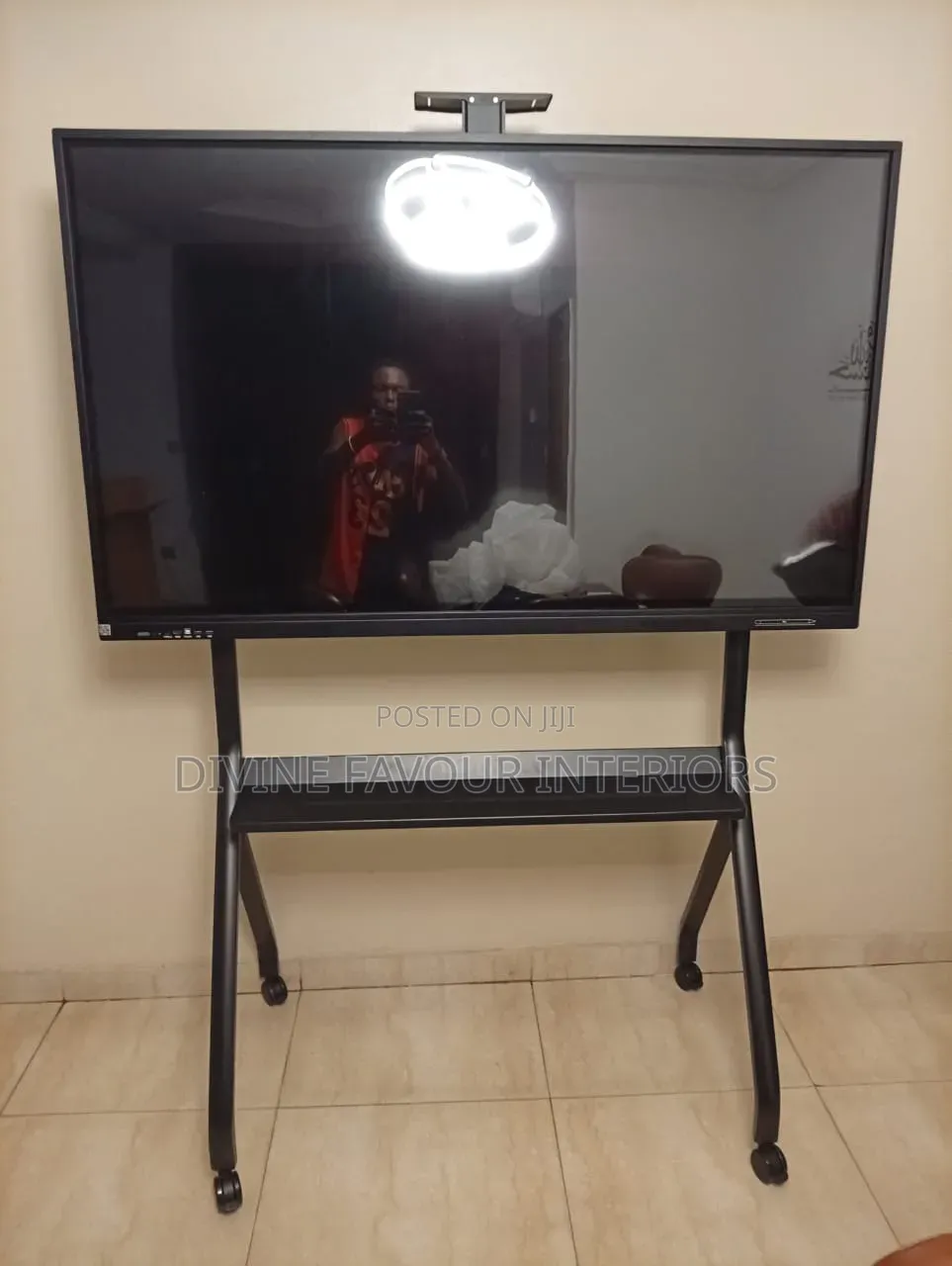 A S 55-100'' Black Mobile Television Stand With Wheels