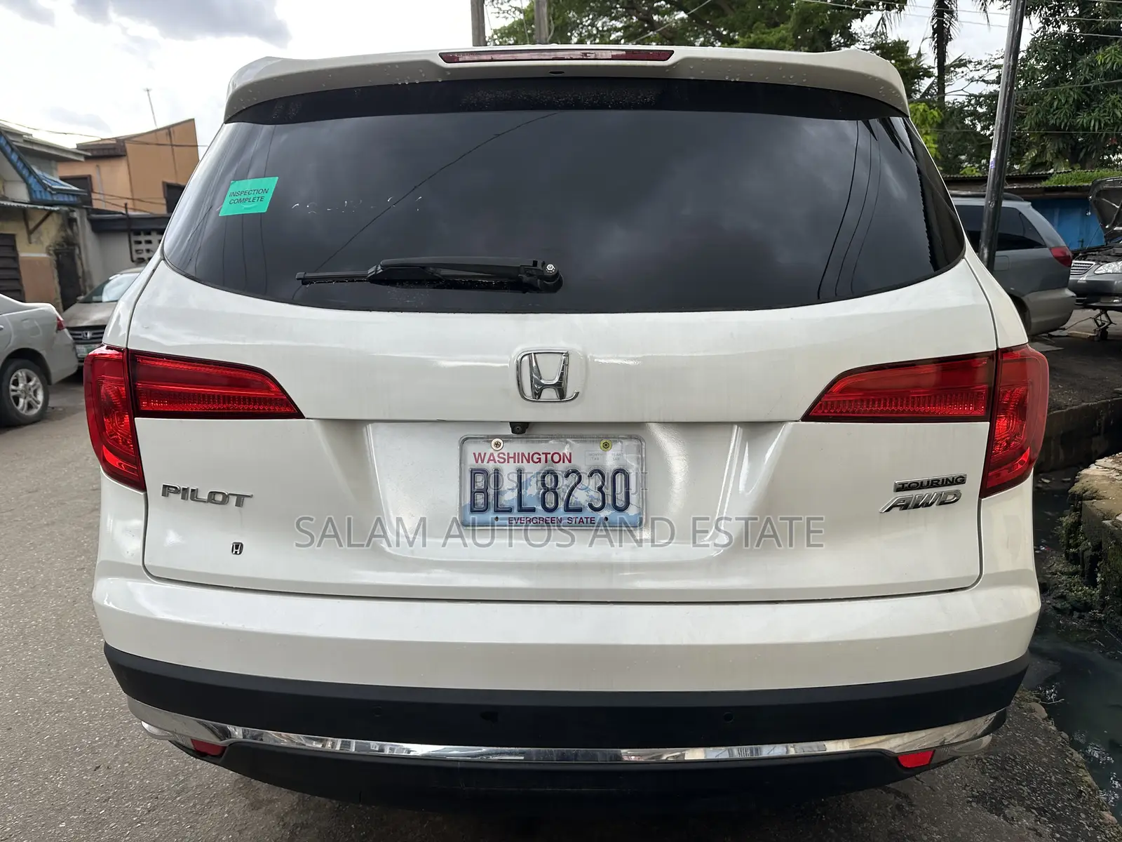 Honda Pilot Touring 4dr SUV 4WD (3.5L 6cyl 9A) 2016 White