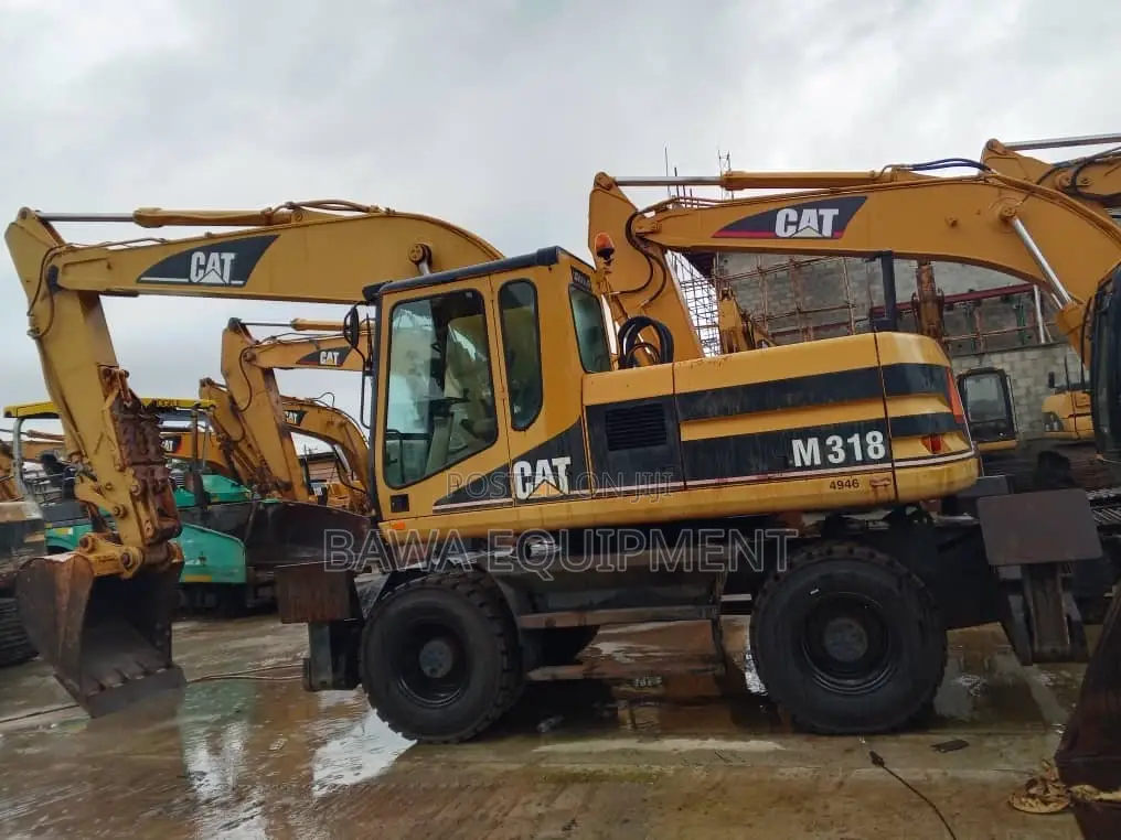 1996 Caterpillar M318 Wheeled Excavator