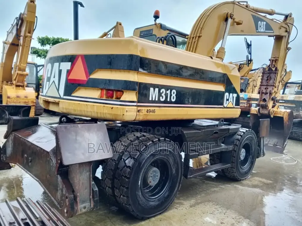 1996 Caterpillar M318 Wheeled Excavator