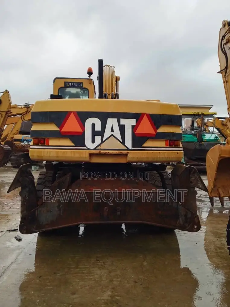 1996 Caterpillar M318 Wheeled Excavator
