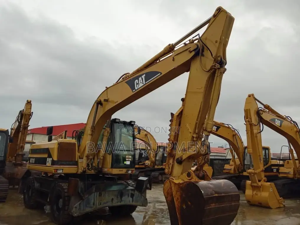 1996 Caterpillar M318 Wheeled Excavator