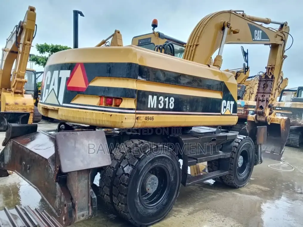 1996 Caterpillar M318 Wheeled Excavator