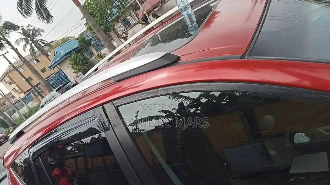 Toyota RAV4 XLE 4dr SUV (2.5L 4cyl 6A) 2015 Red