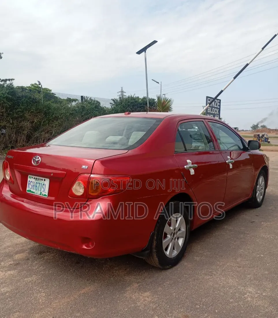 Toyota Corolla LE 4dr Sedan (1.8L 4cyl 4A) 2011 Red