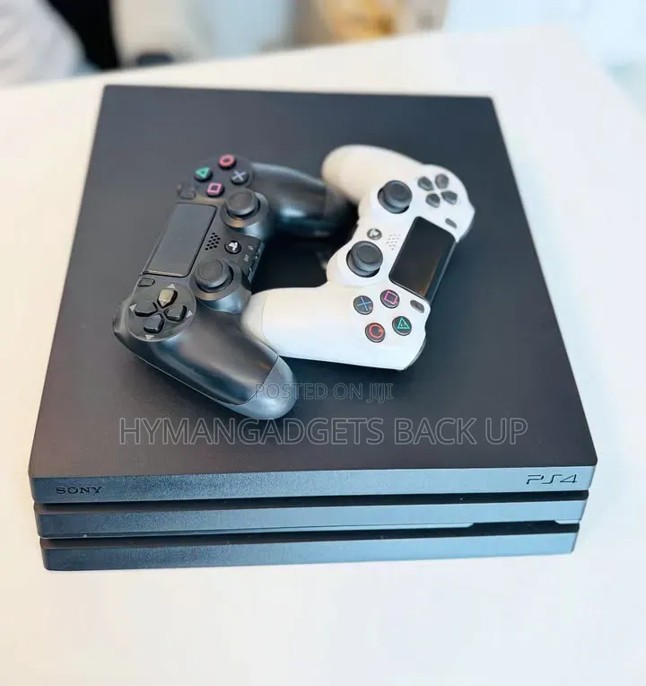 Super Neat Uk Used Ps 4 Pro 1tb With 2 Pads and Games