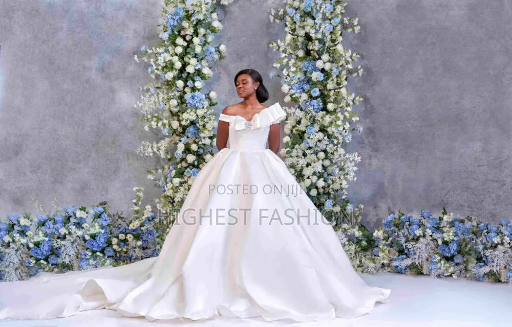 Ball Gown Silhouette, Off-Shoulder, Bow Detail, Chapel Length.