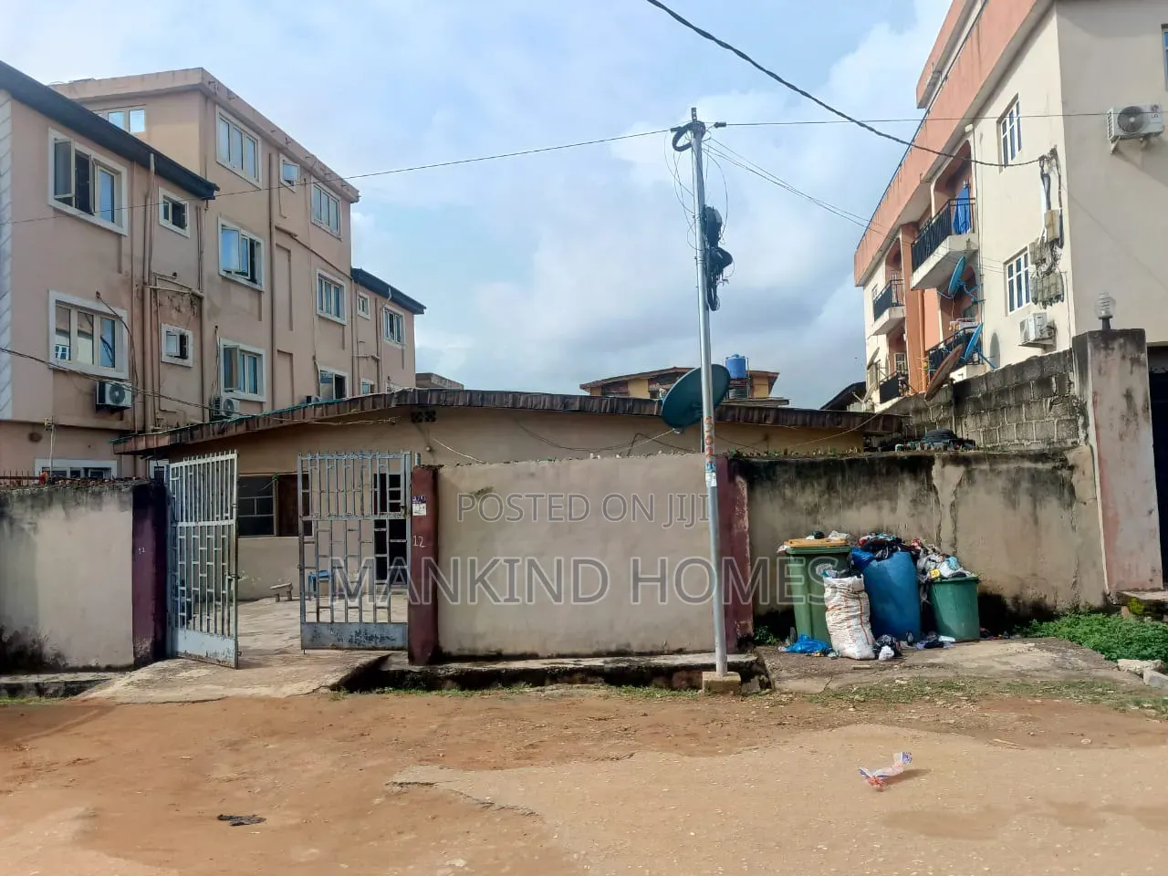 Plot Of Land With A Demolishable Bungalow In Mafoluku For Sale