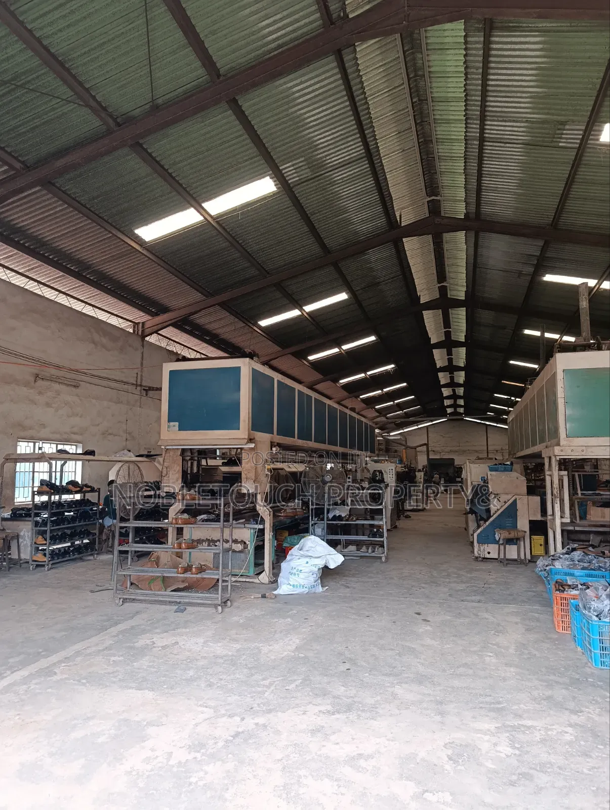 An Industrial Factory/Warehouses Built on 5plots of Land With Cofo