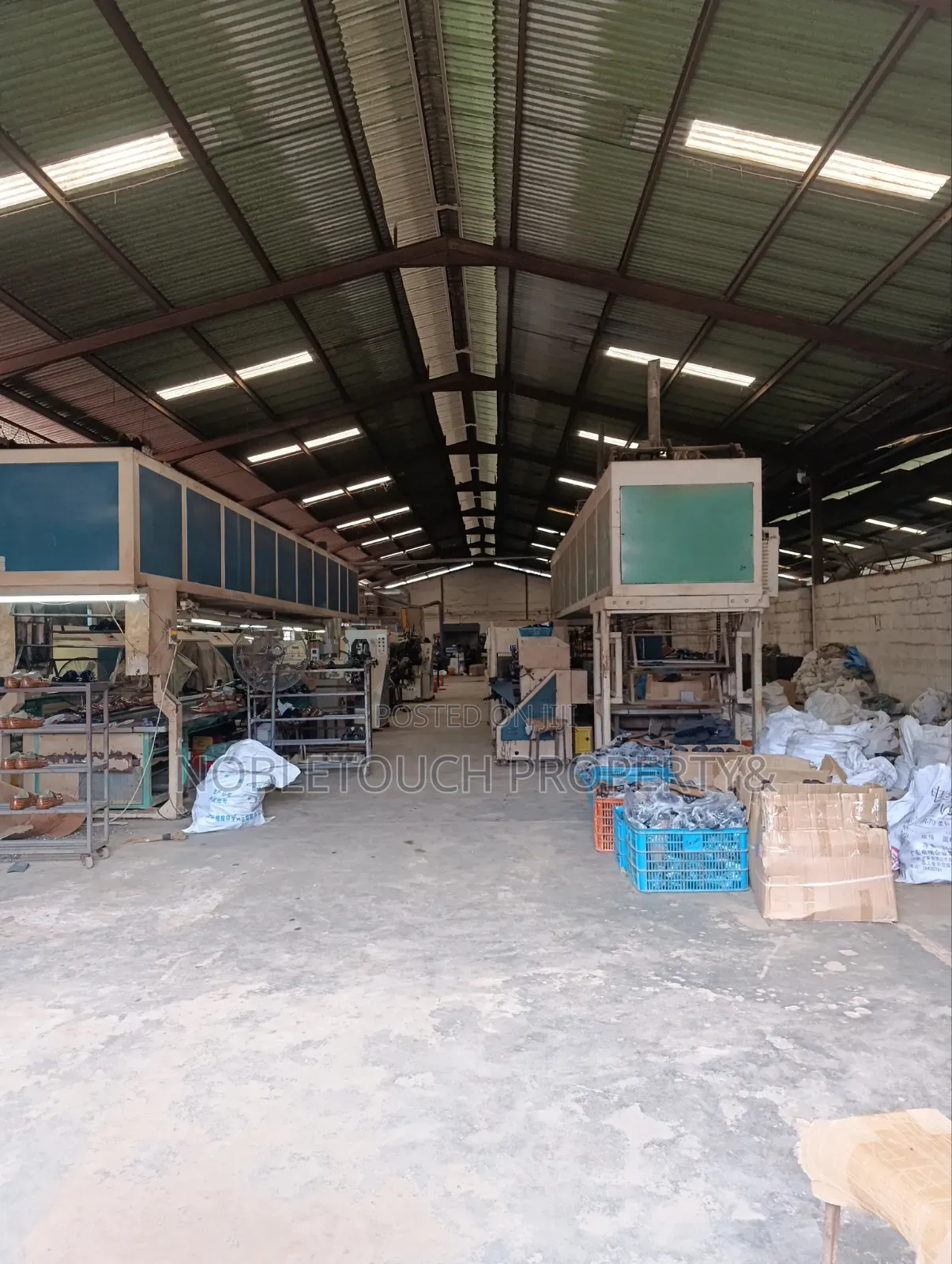 An Industrial Factory/Warehouses Built on 5plots of Land With Cofo