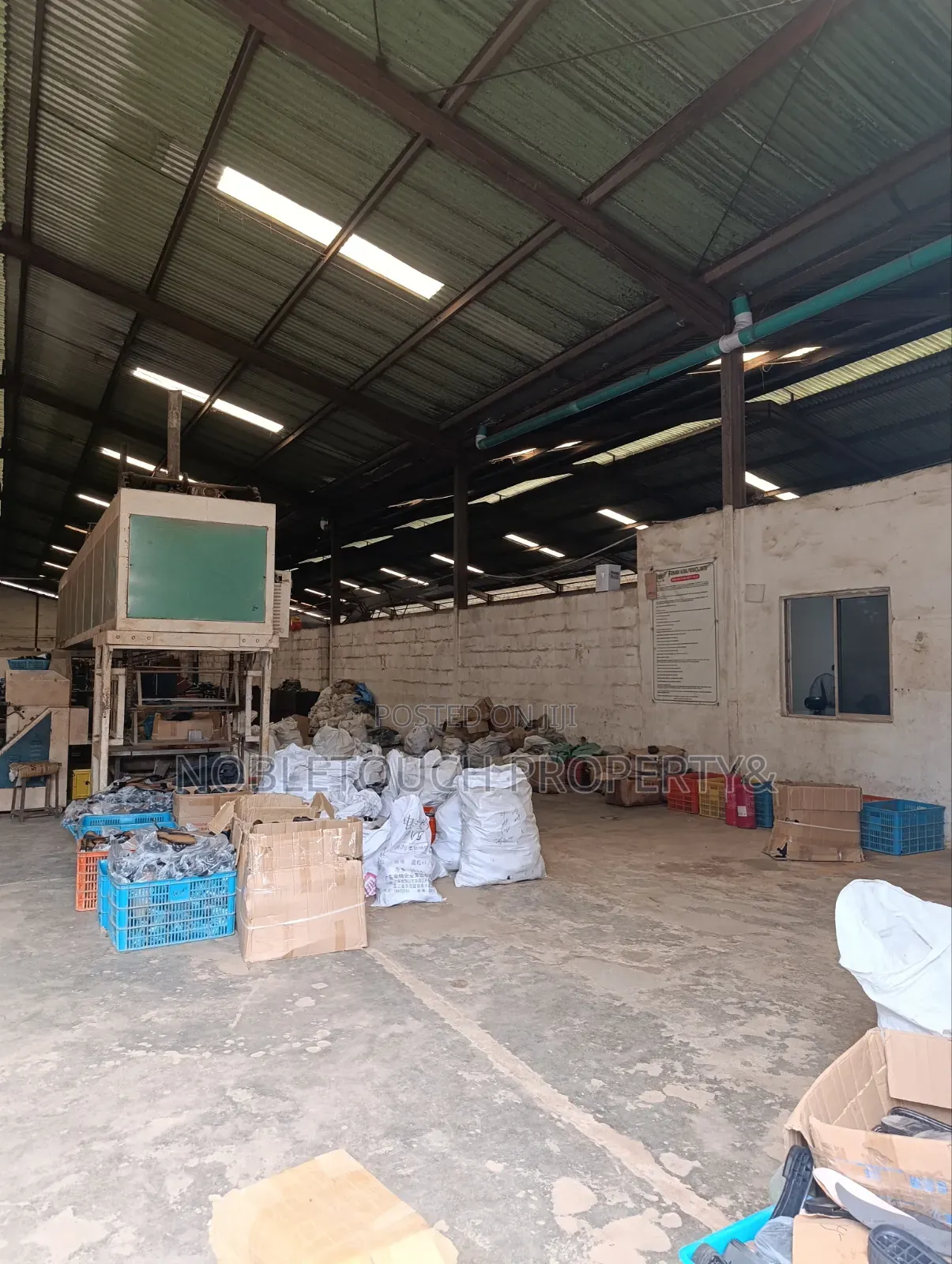 An Industrial Factory/Warehouses Built on 5plots of Land With Cofo