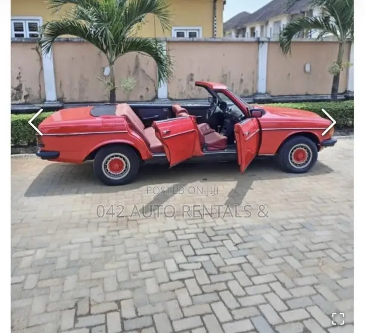Vintage Mercedes Benz W123 Red for Hire