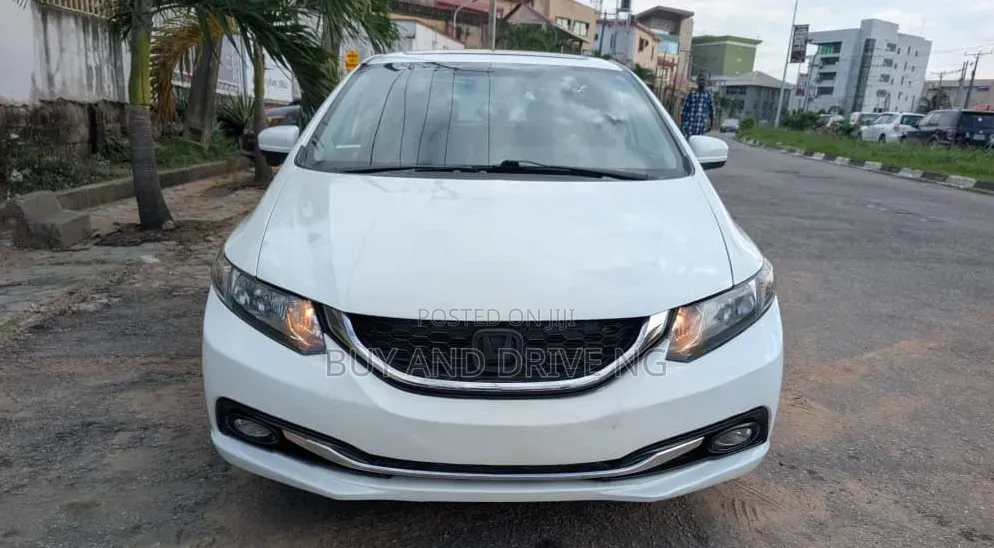 Honda Civic EX-L w/Navigation 2dr Coupe (1.8L 4cyl CVT) 2015 White