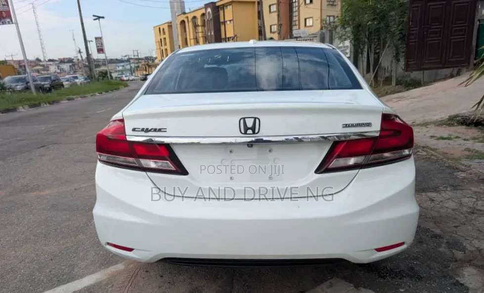 Honda Civic EX-L w/Navigation 2dr Coupe (1.8L 4cyl CVT) 2015 White