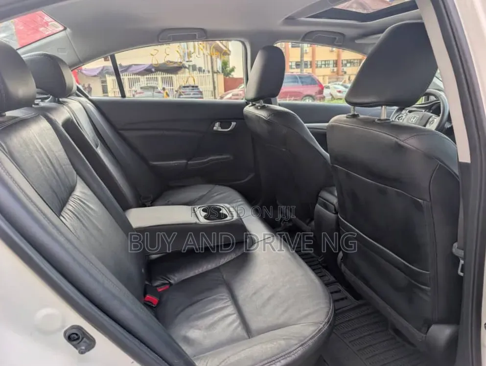 Honda Civic EX-L w/Navigation 2dr Coupe (1.8L 4cyl CVT) 2015 White