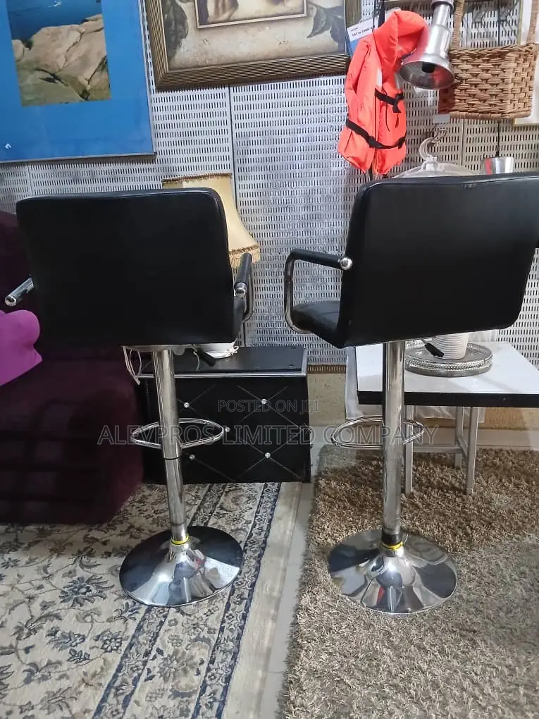 Foreign Used Pair of Ikea Leather Chrome Swivel Chair