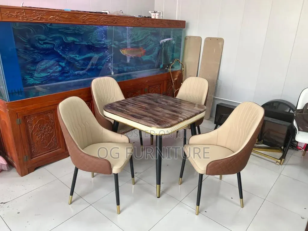 A by 4 Marble Dinning Table With Good Quality of Chairs