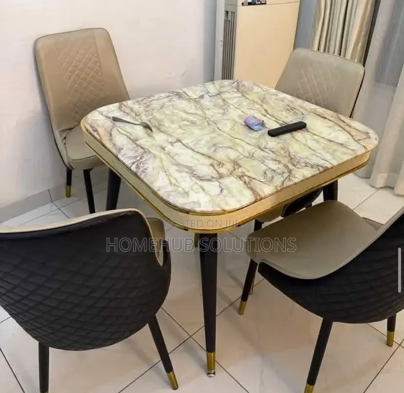 Marble Top Dinning Set ( One Chair Leg Is Shaking)