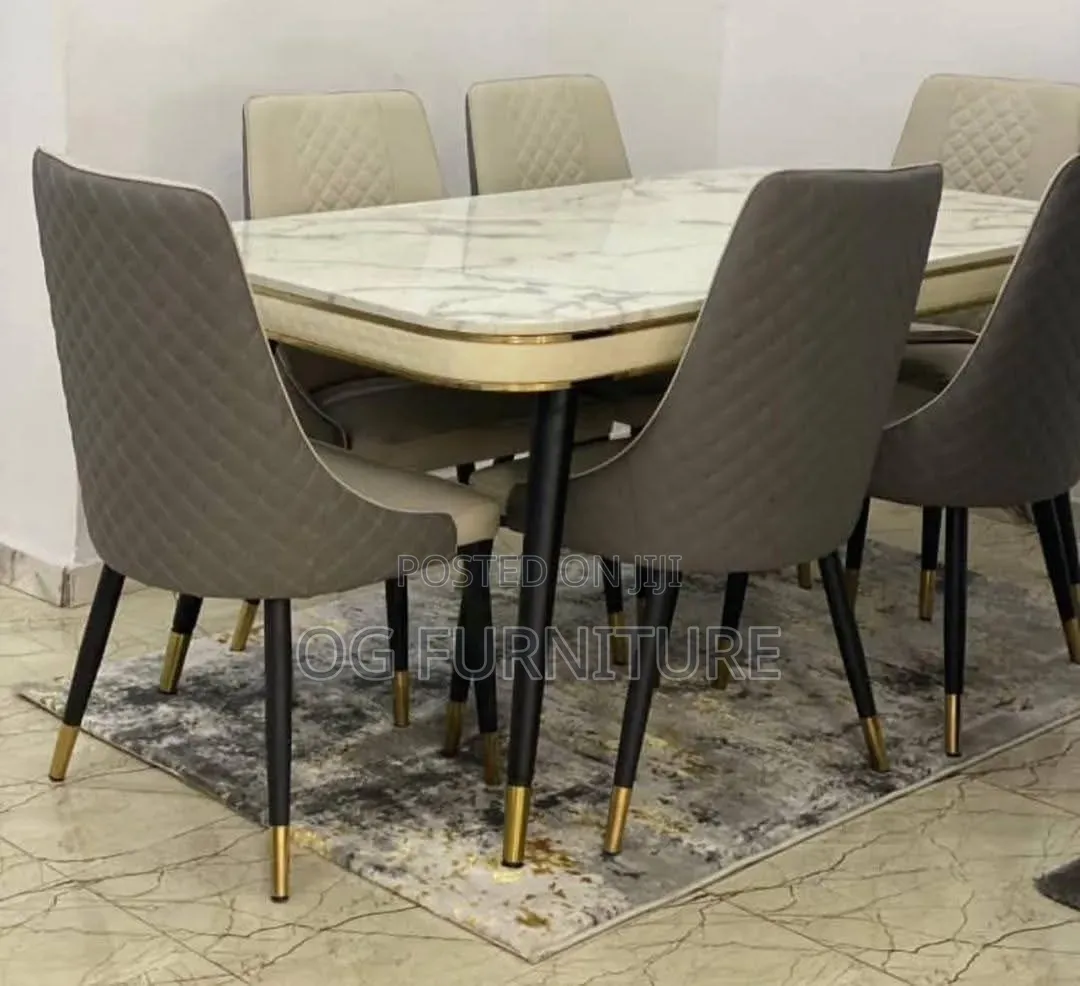 A Standard Luxury Marble Dinning Table With Six Chairs You Can Afford