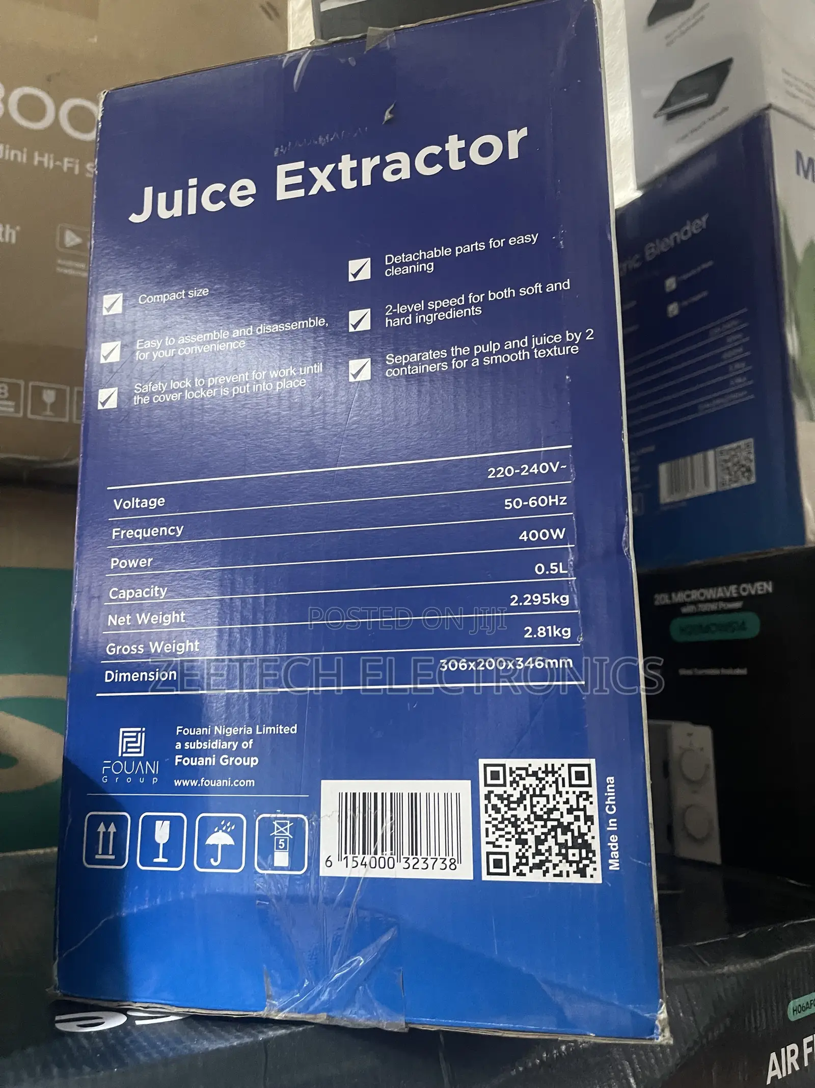 Maxi Je2802 Juice Extractor With a 0.5-Liter Capacity.