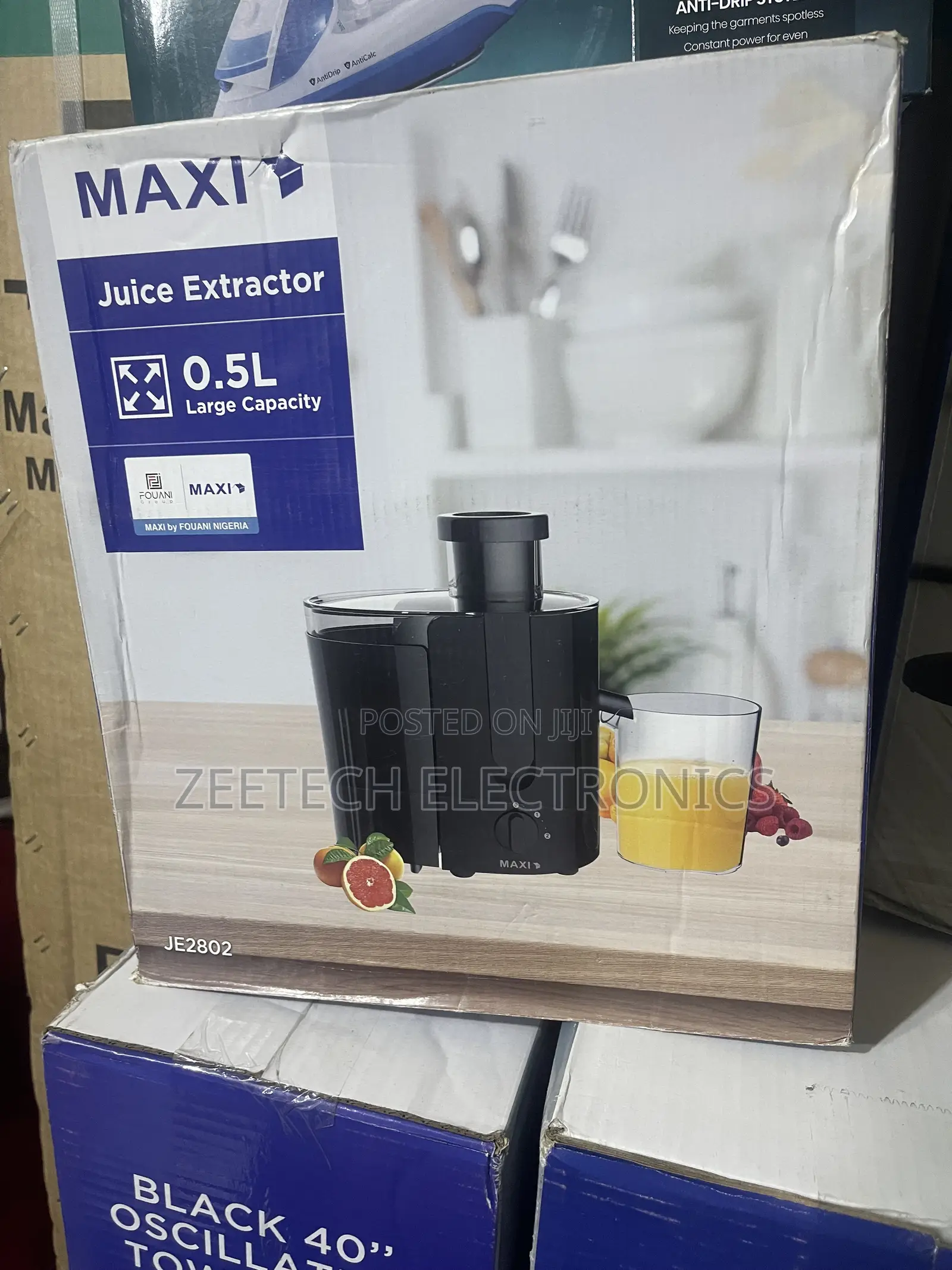 Maxi Je2802 Juice Extractor With a 0.5-Liter Capacity.
