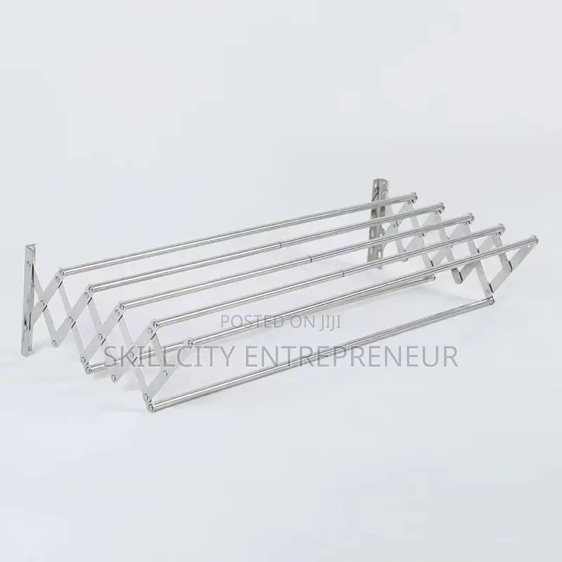 Wall-Mounted, Collapsible Clothes Drying Rack.