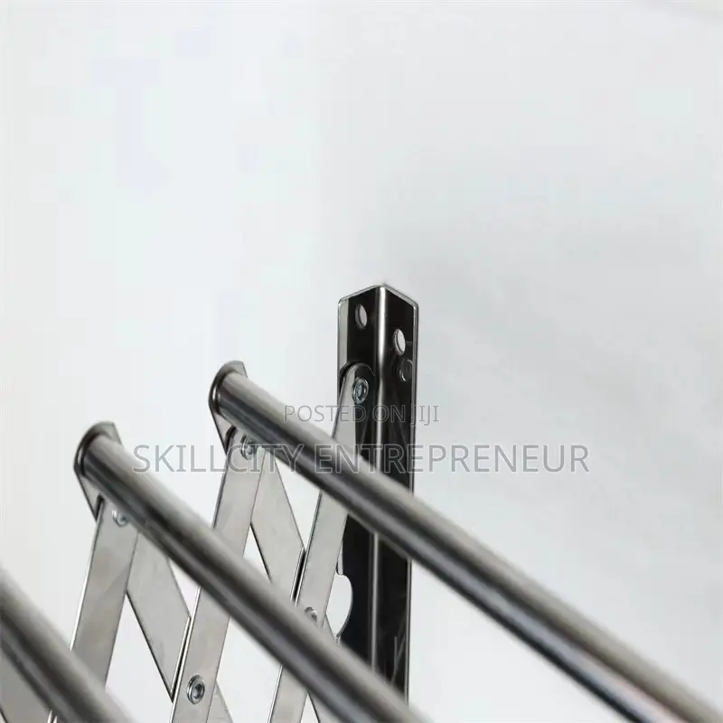 Wall-Mounted, Collapsible Clothes Drying Rack.