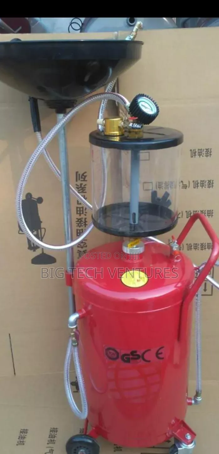 Red Pneumatic Oil Extractor Is a Commercial Automotive Garage Tool