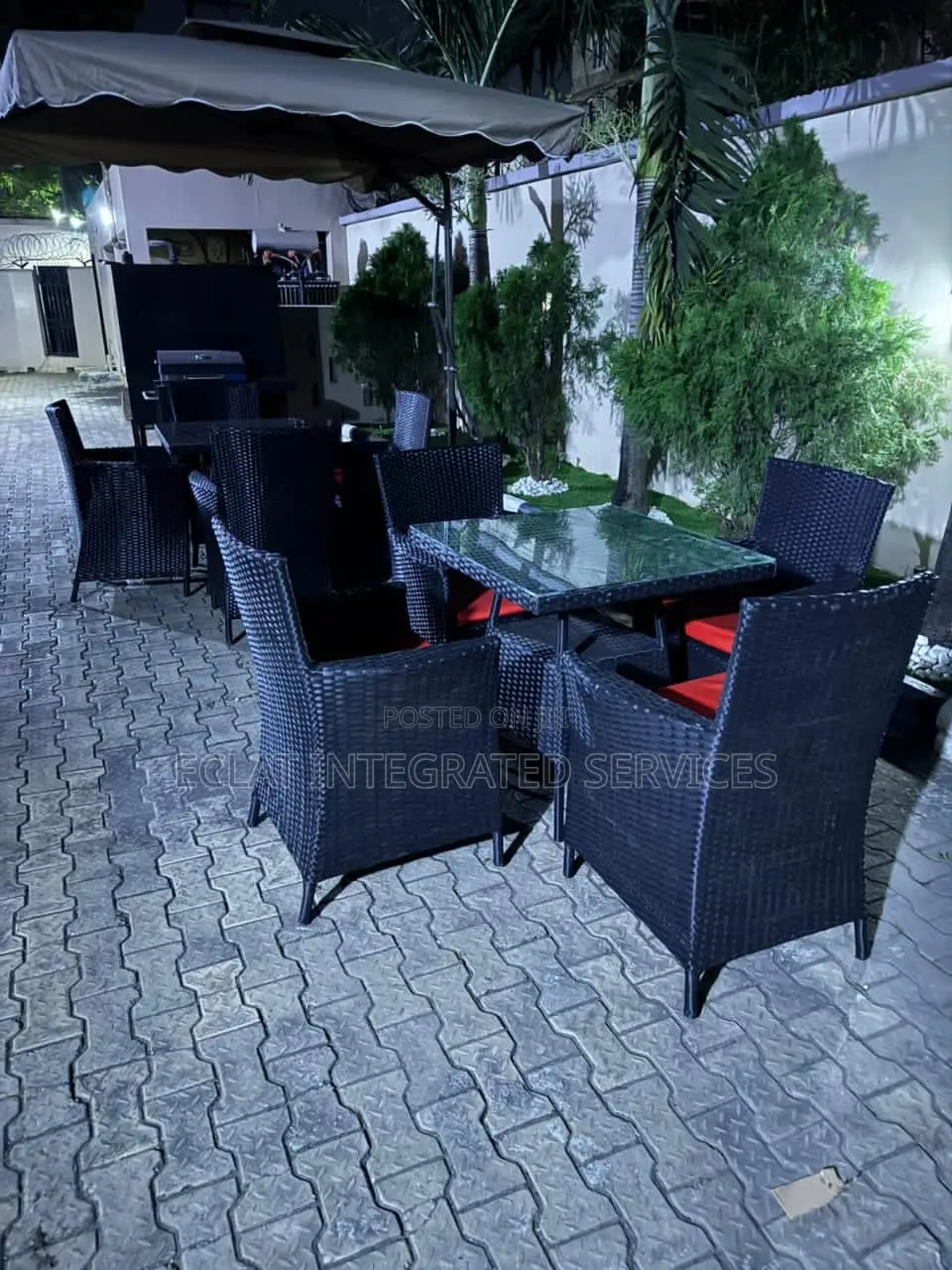 Brown Outdoor Set With Red Cushions