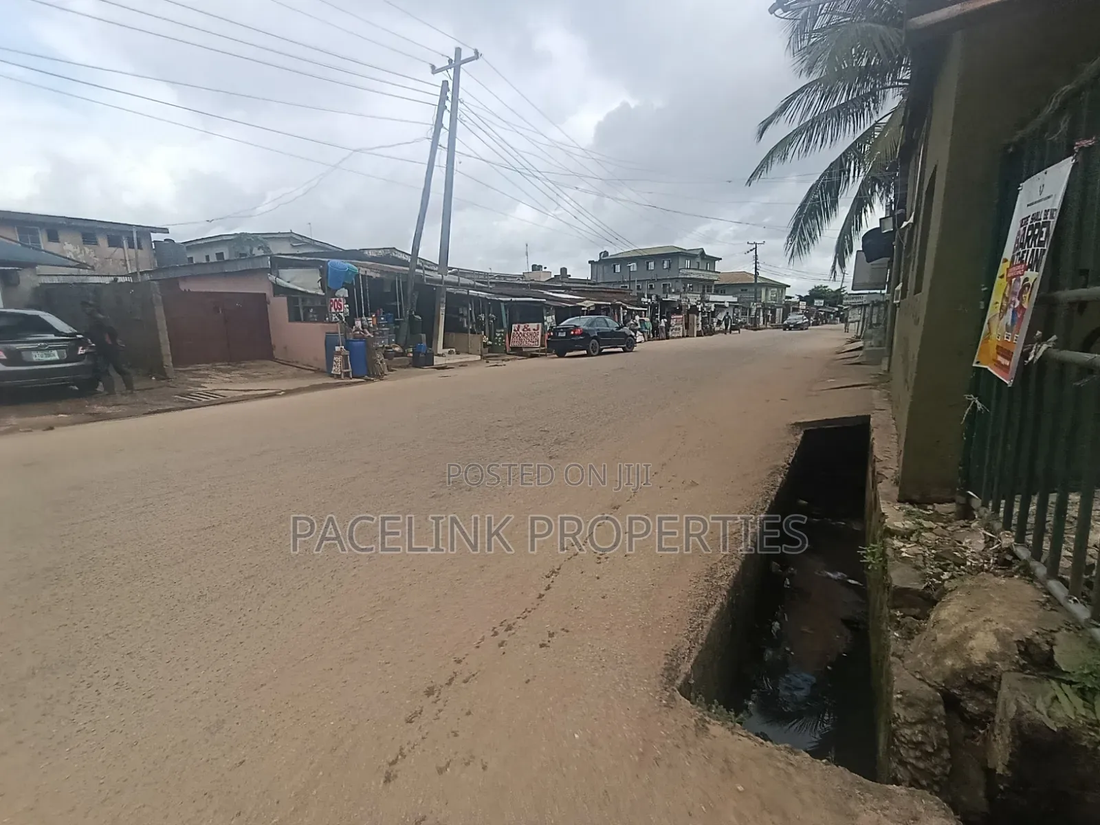 Half Plot of Land Corner Pieces on a Tarred Road