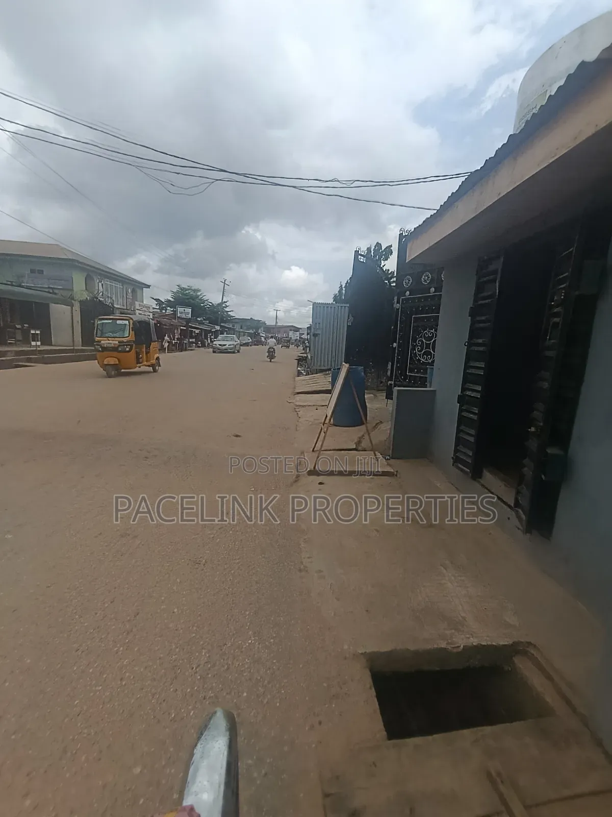 Half Plot of Land Corner Pieces on a Tarred Road