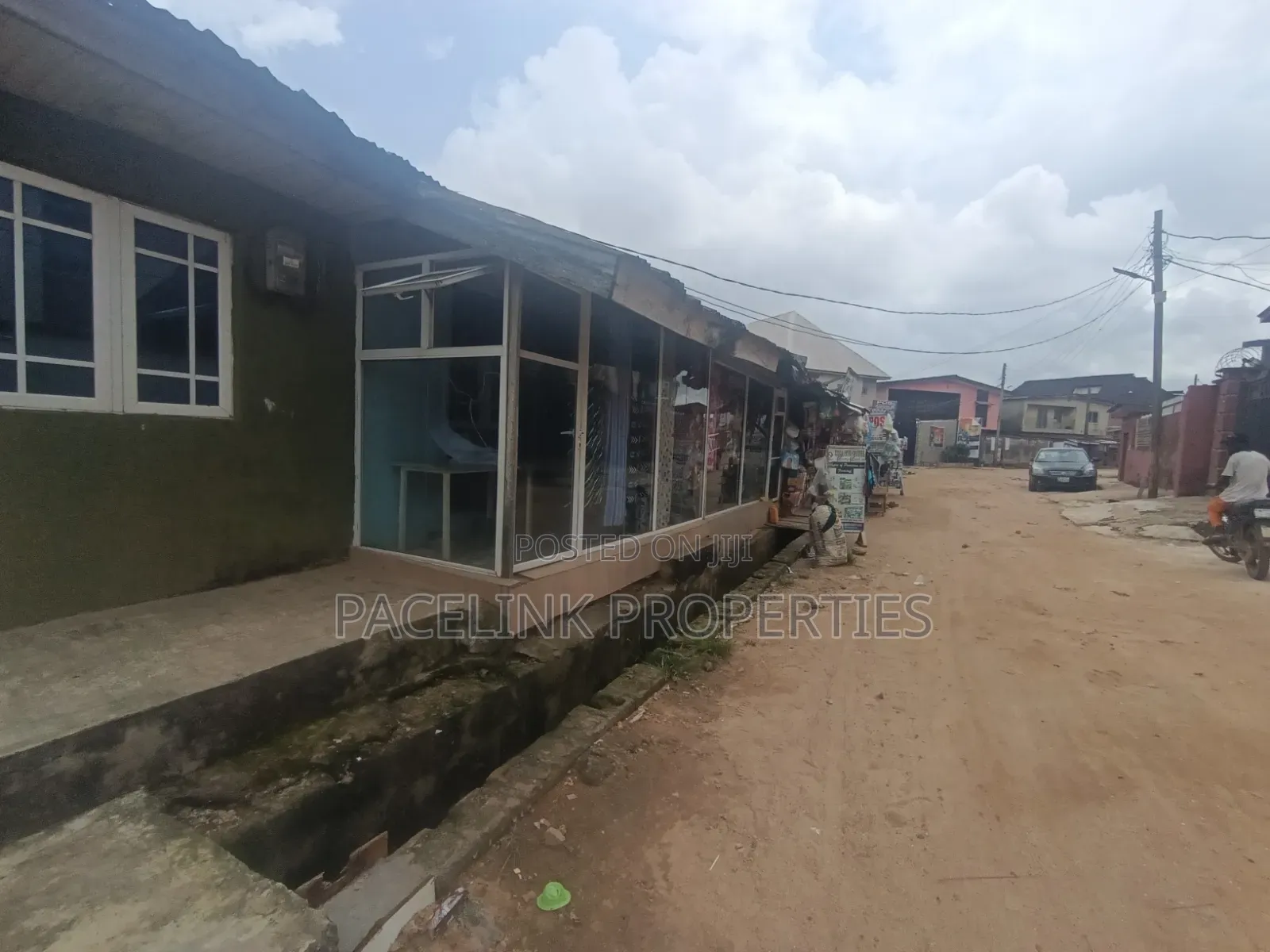 Half Plot of Land Corner Pieces on a Tarred Road