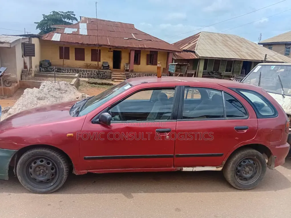 Nissan Almera Tino 2002 Maroon