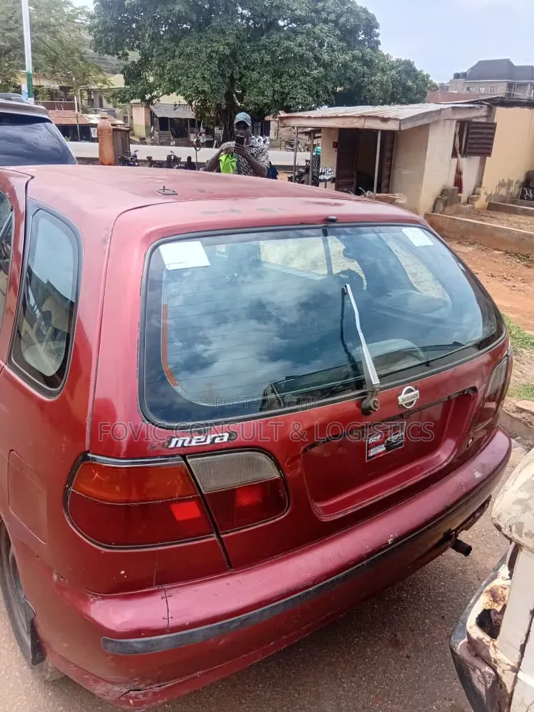 Nissan Almera Tino 2002 Maroon