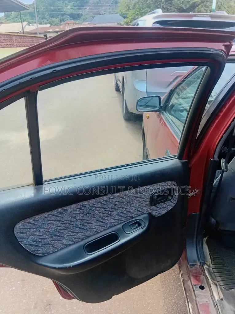 Nissan Almera Tino 2002 Maroon
