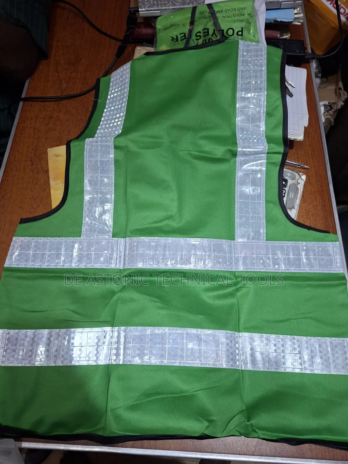 Green Reflective Jacket With Plastic Reflective Stripes