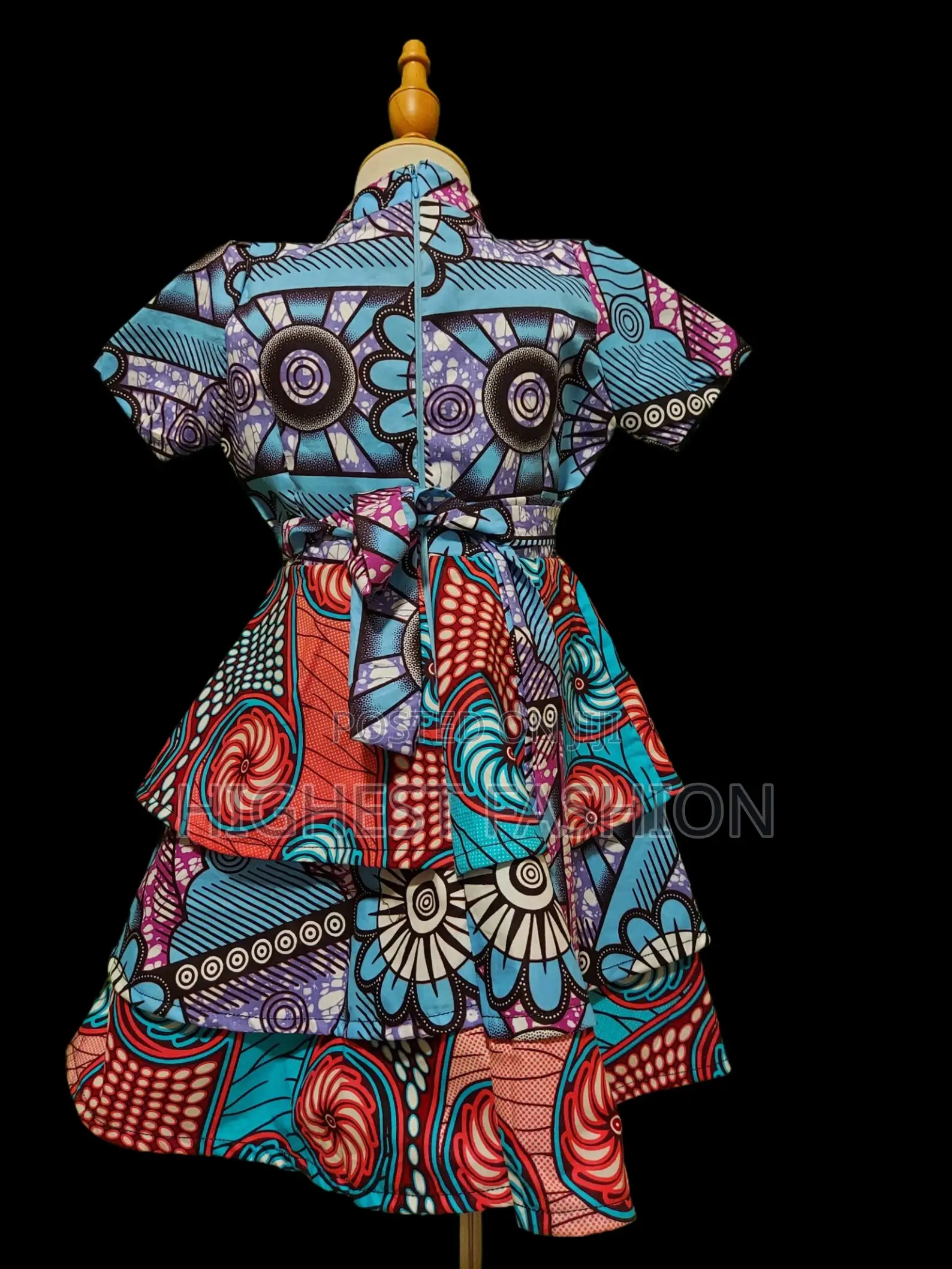 Vibrant African Print Peplum Dress – Handmade Ankara Fashion.