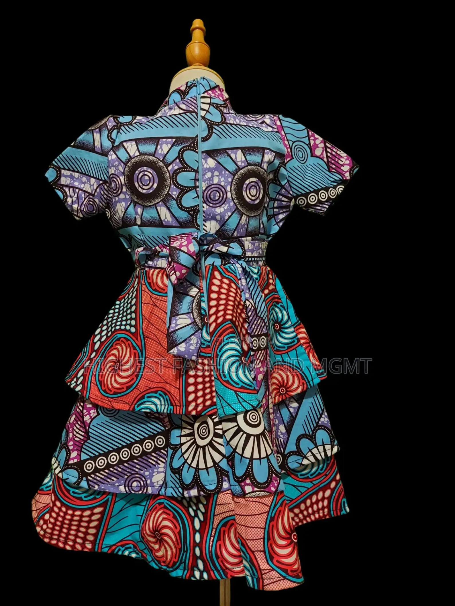 Vibrant African Print Peplum Dress – Handmade Ankara Fashion.