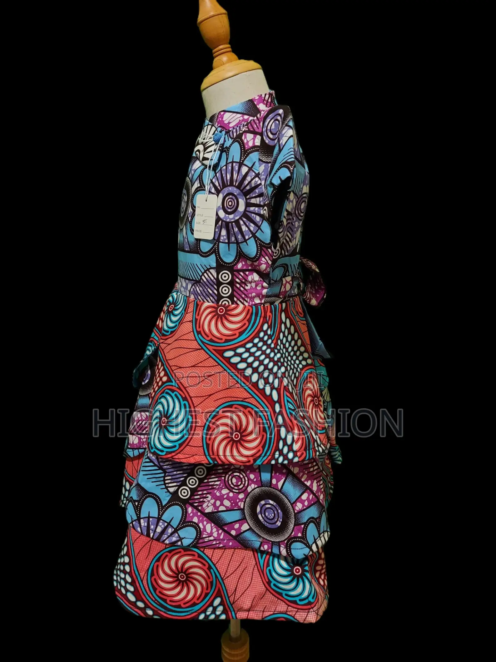 Vibrant African Print Peplum Dress – Handmade Ankara Fashion.