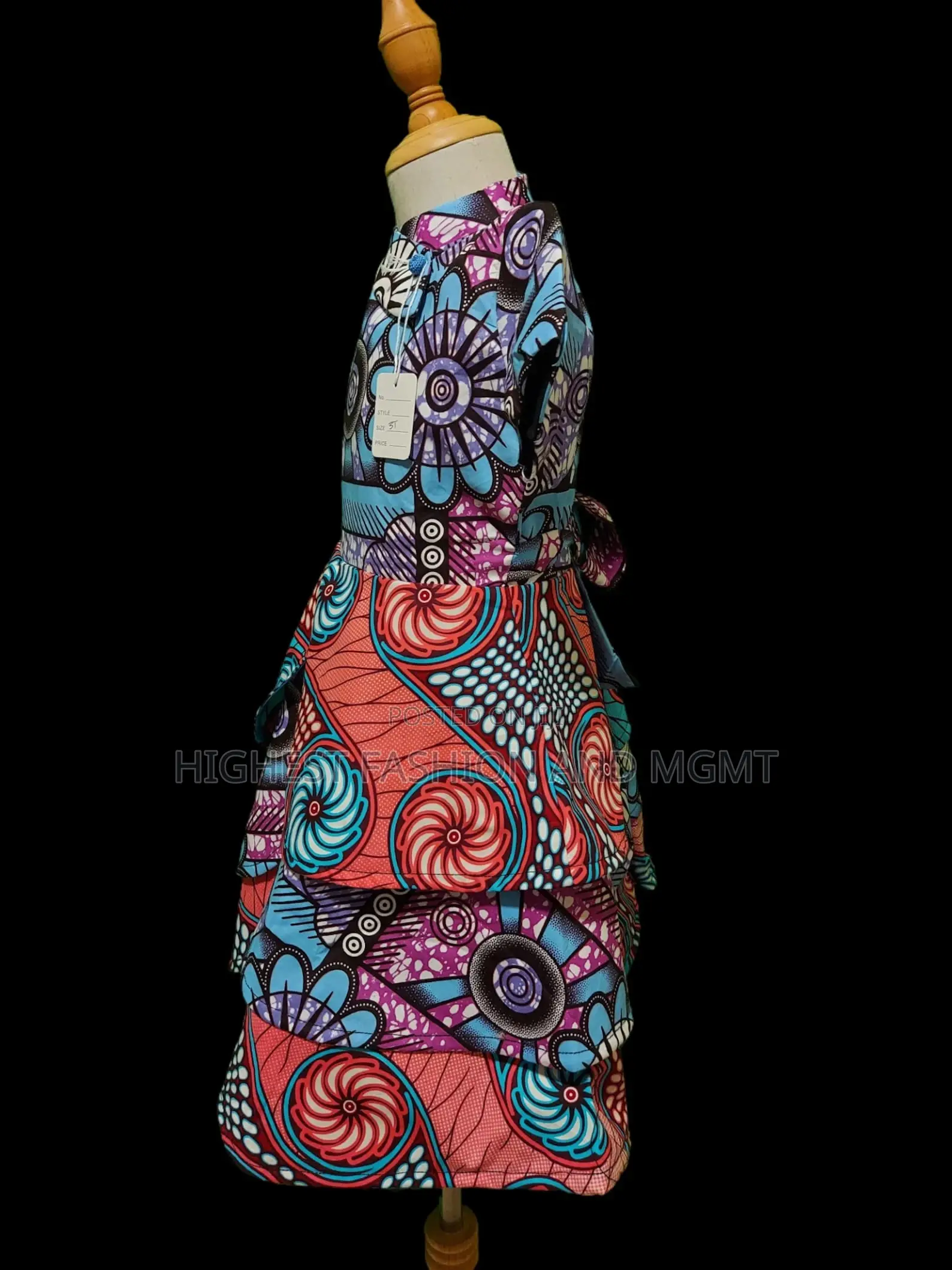 Vibrant African Print Peplum Dress – Handmade Ankara Fashion.