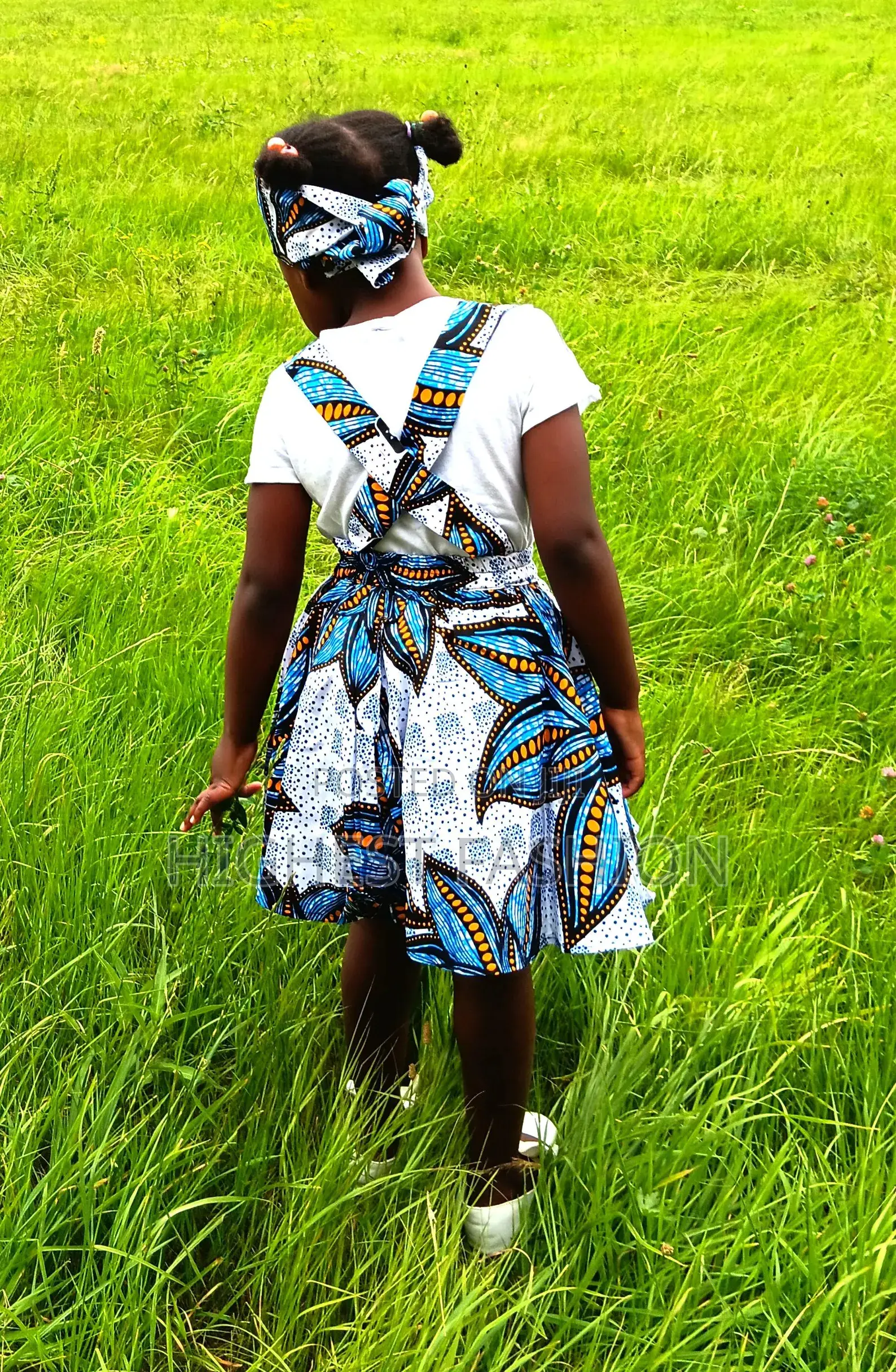 Enchanting Girl's Dress Made of African Wax Fabric