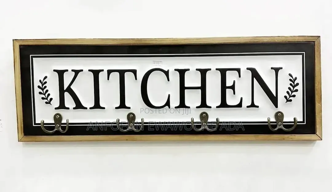 Wall-Mounted Kitchen Hook Rack With the Word "Kitchen"